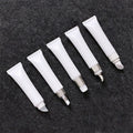 15ml 20ml Cosmetic Sunscreen Isolation Pump Tube Lip Gloss Tube White Eye Cream Tube With Zinc Alloy Ceramic Massage Head