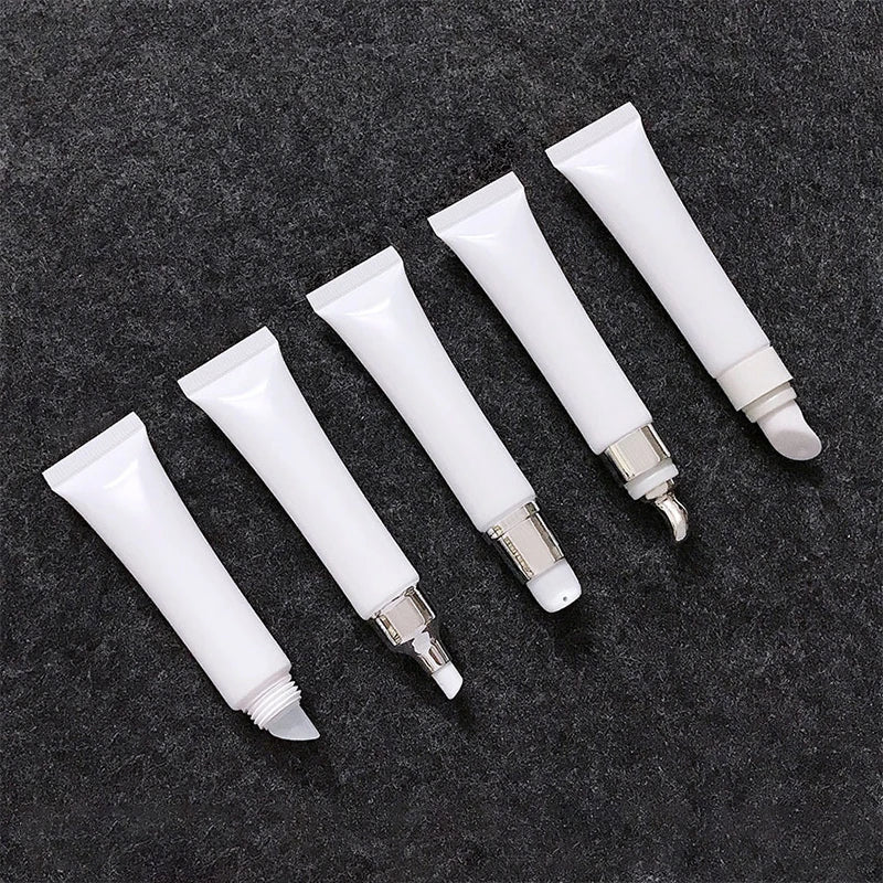 15ml 20ml Cosmetic Sunscreen Isolation Pump Tube Lip Gloss Tube White Eye Cream Tube With Zinc Alloy Ceramic Massage Head