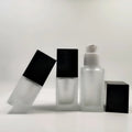 China Made 30ml square clear Cosmetic Black Cap Glass Frosted Lotion Bottle With Pump for Foundation