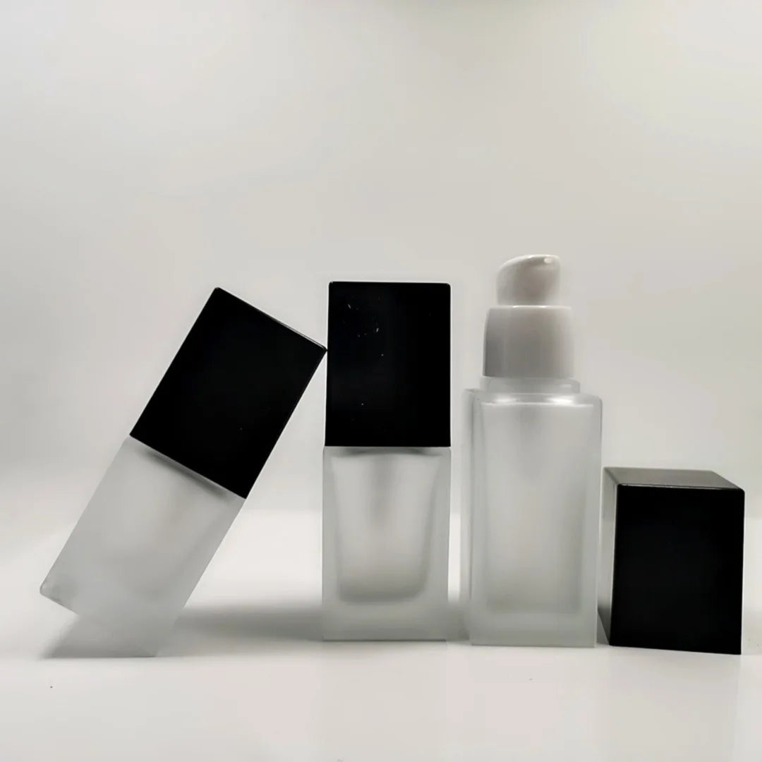 China Made 30ml square clear Cosmetic Black Cap Glass Frosted Lotion Bottle With Pump for Foundation