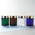 100g Cosmetic Mini Glass Jar  Containers with Lid Customized Colored and Round Shape