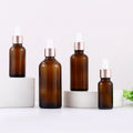 Rose Gold Cosmetic Packaging 30Ml 1oz Brown Amber Luxury Empty Essential Oil Glass Eye  Serum Dropper Bottle