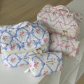 Wholesale Cute Quilted Bow Printing Cosmetic Bag Reusable Eco-friendly Custom Logo Makeup Organizer Bag Makeup