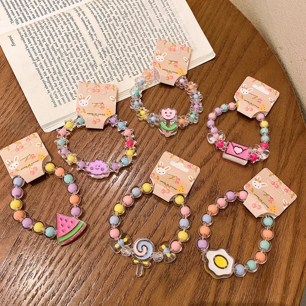 2022 New Arrival Kids Accessories Fashion Pastel Candy Colored Plastic Beaded Heart Crown Flower Pendant Wedding Gift Bracelets