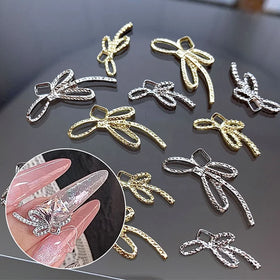 Wholesale Luxury Alloy Bowknot Gold Silver Twinkle Stones 3D Ribbon Nails Art Decoration Nial Art Charms with Monturezz