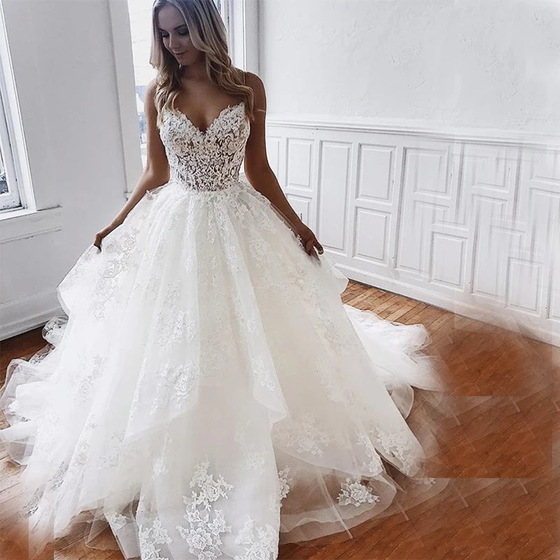 Luxury Princess a Line Appliques Lace Sequins Beading Wedding Dress Backless Spaghetti Strap Vestido De Novia 2025 Bridal Gowns