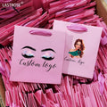 Wholesale Luxury Pink Customized Packaging Paper Gift Bags Handle for Mascara Skin Care Essential Oils Private Label Empty Paper