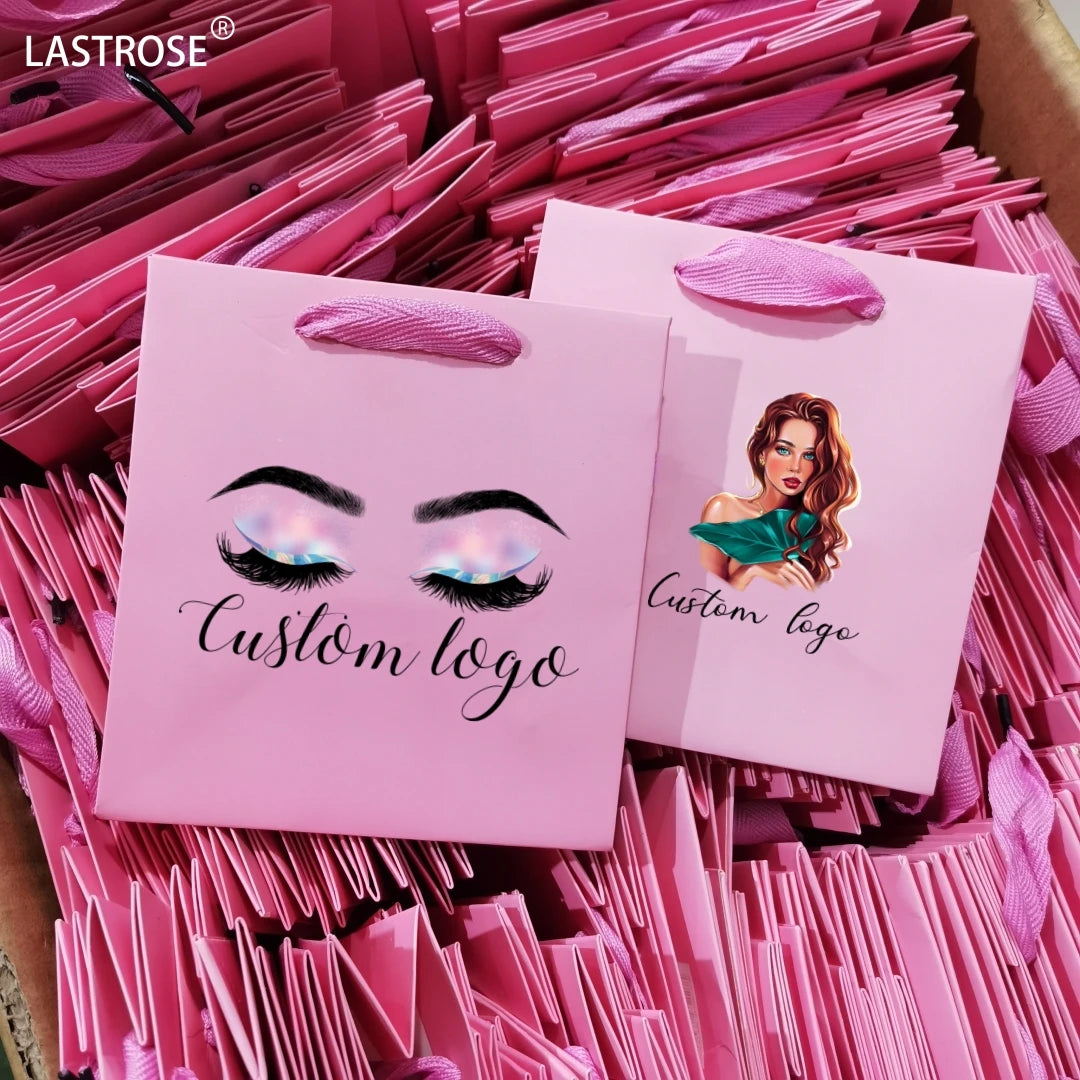 Wholesale Luxury Pink Customized Packaging Paper Gift Bags Handle for Mascara Skin Care Essential Oils Private Label Empty Paper