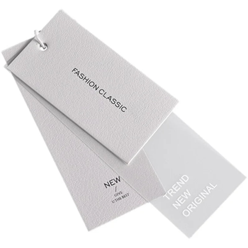 Custom Logo PVC Hangtags Frosted White Jeans Paper Swing Clothing Tags with Foil Technique Shoes Bags Embossed Garment Swing Tag