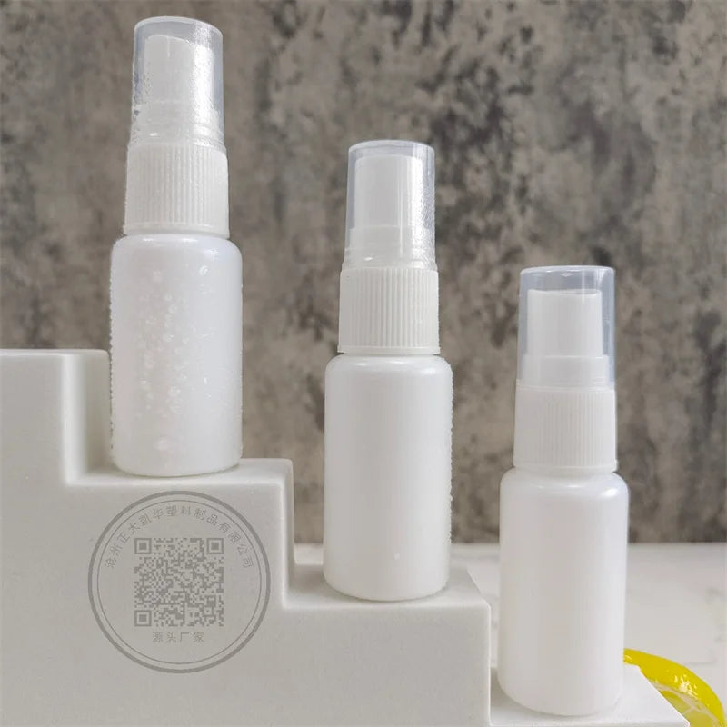 Travel Portable Mini 20ml PE Cosmetic Fine Mist Spray Bottle with Screen Printing and Pump Sprayer