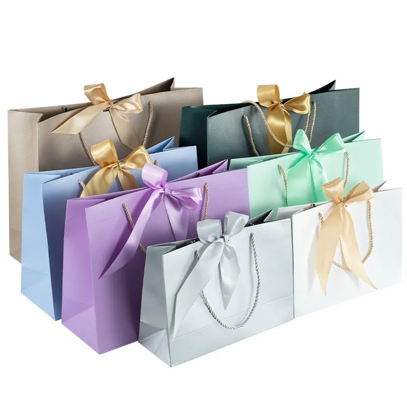Custom Luxury Fashion Gift Carry Bags Special Paper Boutique Shopping Paper Bags With Bow