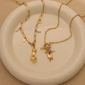 Delicate Elegant High Fashion Waterproof Stainless Steel Gold Plated OT Knotted Necklace with Stones Palms Charm