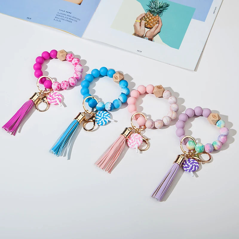 2026 Handmade Tie Dye Rainbow Silicone Beads Leather Tassel Wristlet Bracelets Lollipop Pendant Keychains Bracelet for Gril