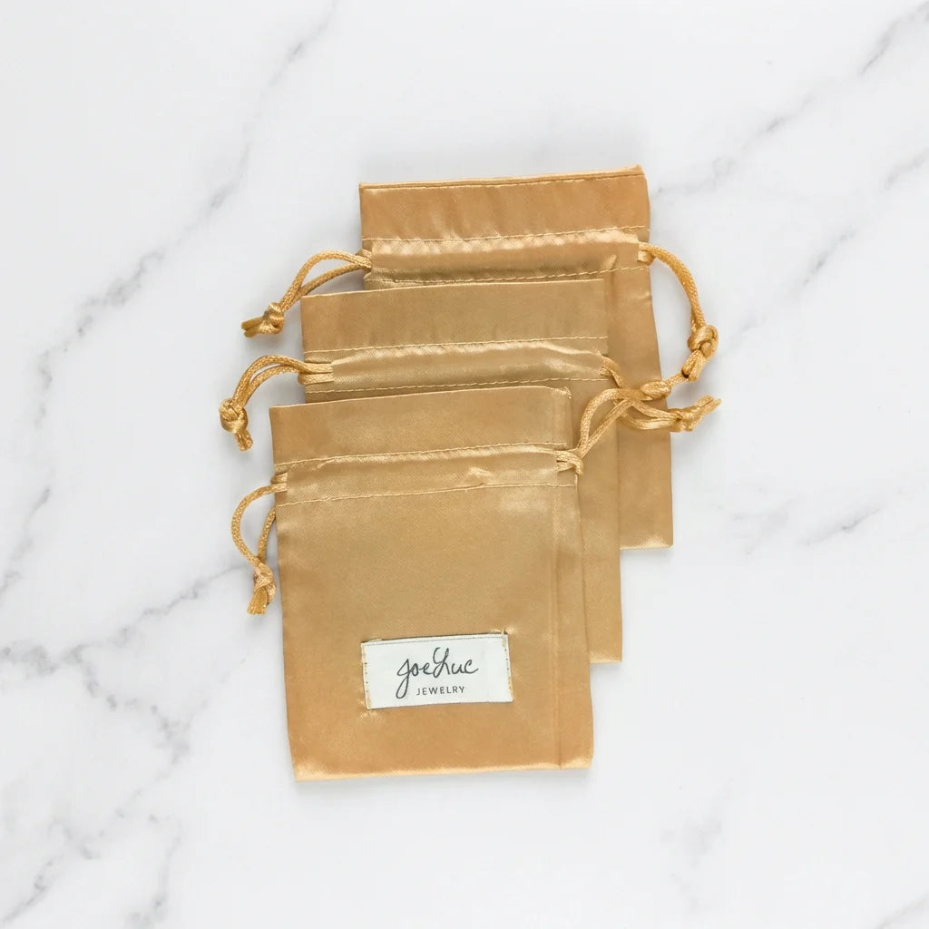 Custom Silk Satin Drawstring Jewelry Bags with Woven Logo Label for Small Accessories and Gift Packaging