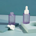 Skincare Packaging Cosmetic Frosted Purple Flat Shoulder Cylinder 30 ml Glass Essential Oil Dropper Bottle Empty