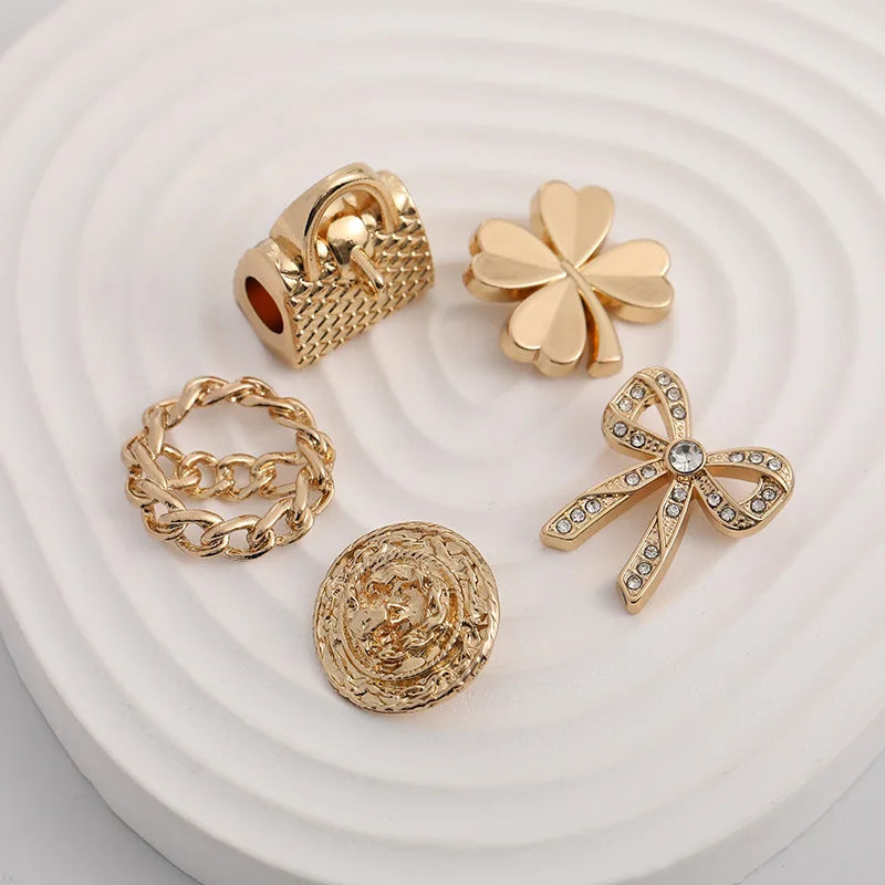 High Grade Elegant Shiny Diamond studded Hollow Out Four Leaf Clover Bowknot Handbag Shape Alloy Shank Button