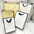 OEM Customizable Kraft Gift Shopping Paper Bag White Brown Color with Logo Printed and Handles for Personalized Gifts