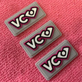 Eco-friendly Wearable Embossed Silicone Rubber Labellead-free Soft PVC Plastic Gloves Label