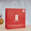 Luxury Business & Shopping Art Paper Customized Recyclable Kraft Paper Bags for Clothing & Shoes with Custom Handle