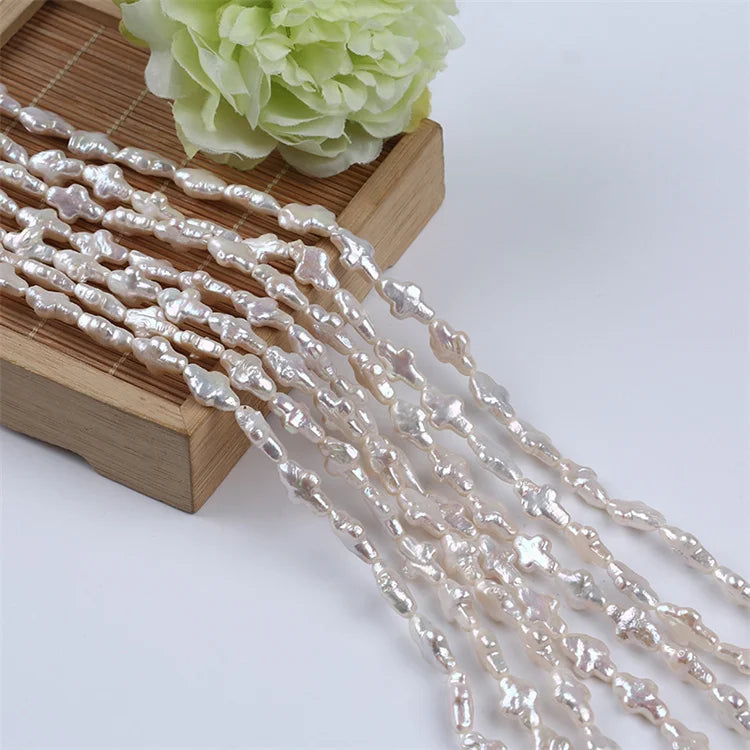 Zhuji Wholesale 8*14mm Natural White Baroque Irregular Cross Shape Grade a Third Party Certified Freshwater Pearl Strand CN ZHE
