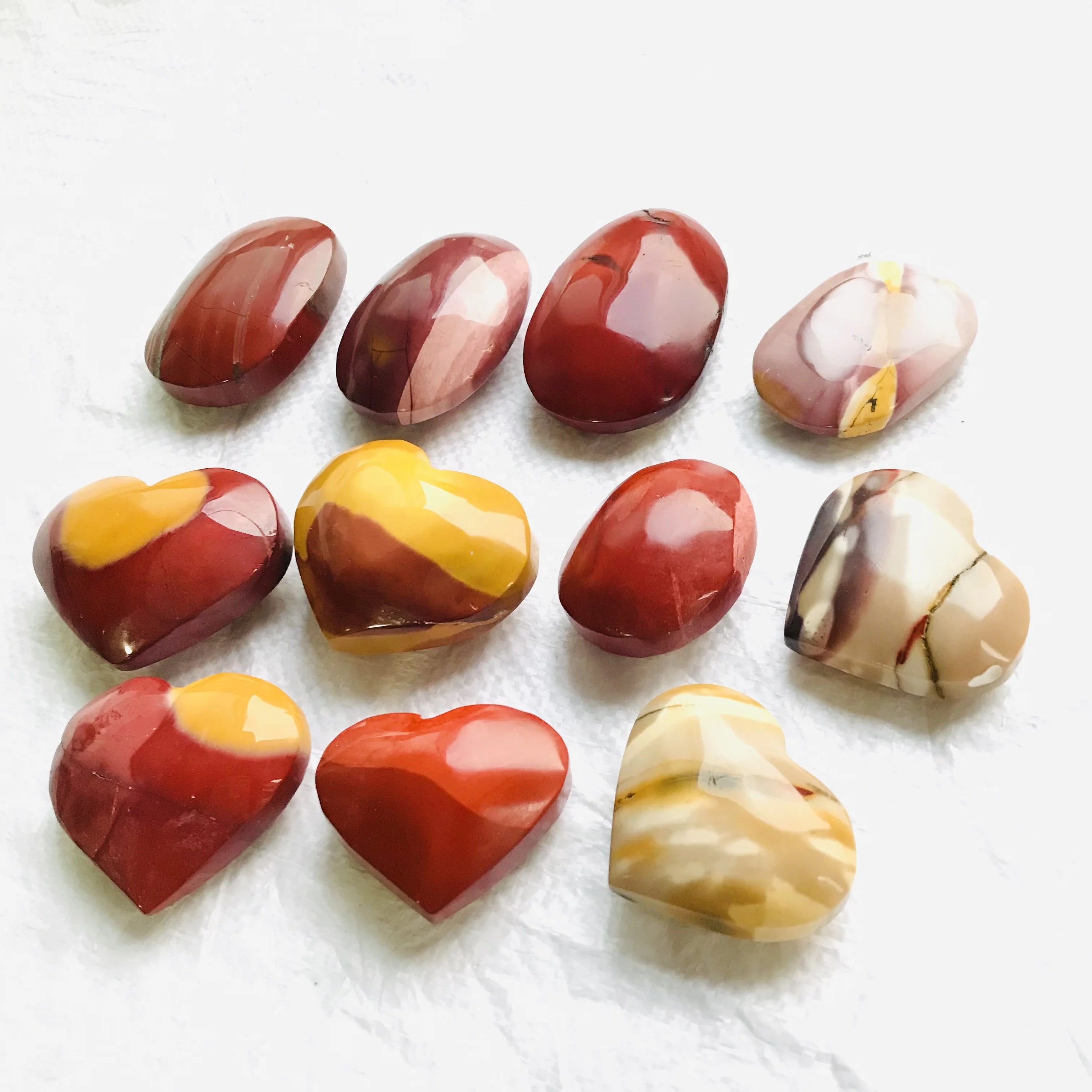 Latest New Popular Natural Crystal Mookite Yolk Stone Heart Palm Stone Shape for Hot Sale