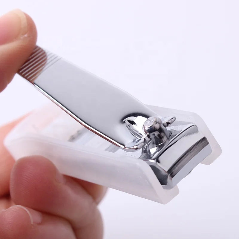 China Manufacturer Cheap Carbon Steel Transparent Cover 7cm Finger Nail Clippers for Personal Care