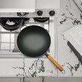 Durable Versatile Cast Iron Wok Chinese Carbon Steel Frying Pan Enamel Wooden Lid Gas Induction Compatible Kitchen Essential