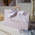 Casual Style Triangle Shape Collapsible Paper Gift Bag with Circle Wooden Handle for Mascara Skin Care Essential Oil Lipstick