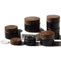 Hot Sale 5g 10g 15g 20g 30g 50g 100g Facial Care Cosmetic Packaging Matte Black Cosmetic Glass Cream Jar With Dark Wood Lid