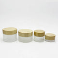 Wholesale 5g 10g 15g 20g 30ml 50g 60g 100g clear Frosted Glass Jar with Bamboo Lid for Cosmetic Skincare Scrub Cream Custom