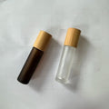 Wholesale 5ml 10ml Dark Brown Amber Frost White Frost Roller Essential Oil Glass Bottles Bamboo Lid Cylinder Shape Roll Sealing