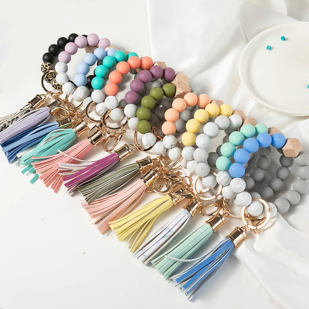 Customized Silicone Bead Bracelet Keychain for Women Handmade Tassel Wooden Beaded Keychain Bracelet