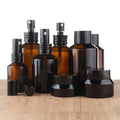 New Arrival 120ml Amber Black Clear Blue Oblique Shoulder Skincare Cosmetic Glass Pump Bottle for Lotion Packaging Bottles