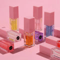Vegan Fruit Shimmer Lip Oil Private Label Liquid Transparent Lip Gloss Wholesale Mini Plump Moisturizing Tint Magic Lip Oil