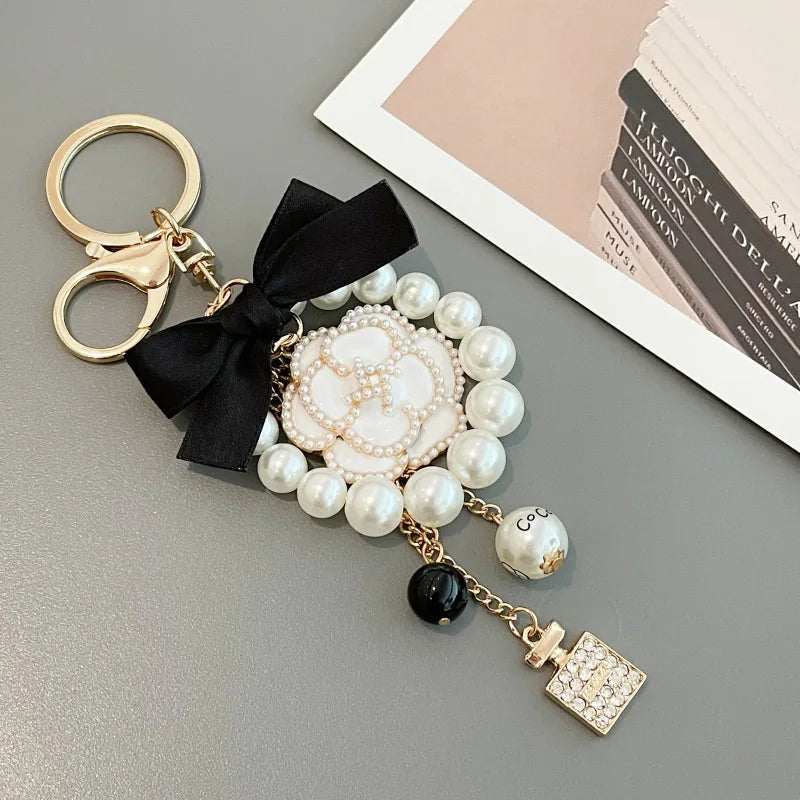 Camellia Flower Pearl Tassel Black Bow Tie Pendant Bag Decoration Shape Keychain Jewelry Key Chain for Women Bag Gift