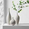 Simple Creative and Elegant Contemporary Tall Home Ceramic Pure White Vase for Tabletop Flower Arrangement Decoration