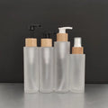 Low MOQ Luxury 60ml Bamboo Pump Lotion Spray Bottle 2oz Glass with Bamboo Lid for Face Cream & Skin Care