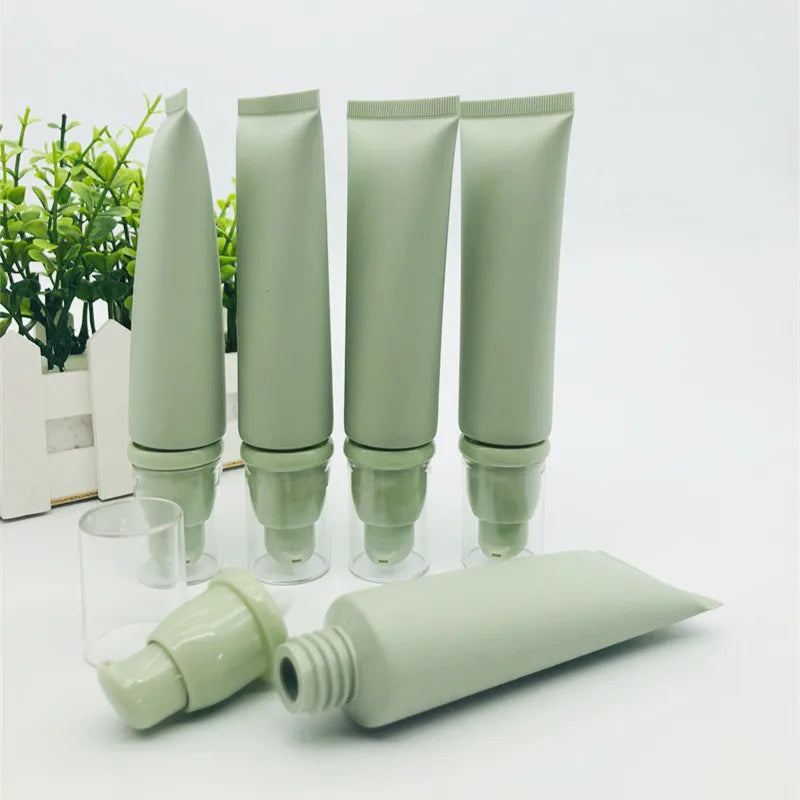 Wholesale 50ml Matte Green Soft Cosmetic Liquid Foundation 50g Soft Tube Green Airless Pump Oil Moisturiser Tube clear Cap