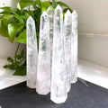 Factory Price Natural Crystal Hand Carved clear Quartz Single Pointed Caring for Healing