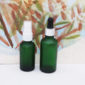 15ml 30ml 50ml Green Cosmetic Essential Oil Glass Bottle with Black Mist Sprayer