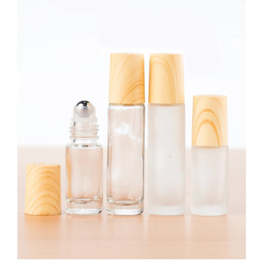 Travel Size 5ml 10ml Essential Oils Roller Bottle Clear Frosted Glass Cylinder with Steel Roller and Wood-Look Plastic Lid