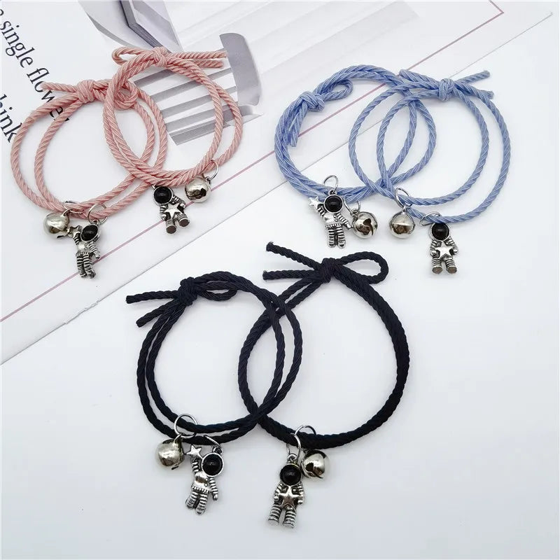 A Pair of Spaceman Bell Bracelets Astronaut Pendant Rope Hand Jewelry for Women Men