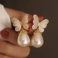 Huitan Women Butterfly Pearl Dangle Drop Earrings for Female Cubic Zirconia Silver/Gold Plated CZ Ladies Bridal Pendant Earrings