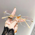 Hot Selling Unisex Optical Frameless Eyewear Anti-Light Blue Cat Eye Prescription Glasses Classic Color PC Rimless Reading