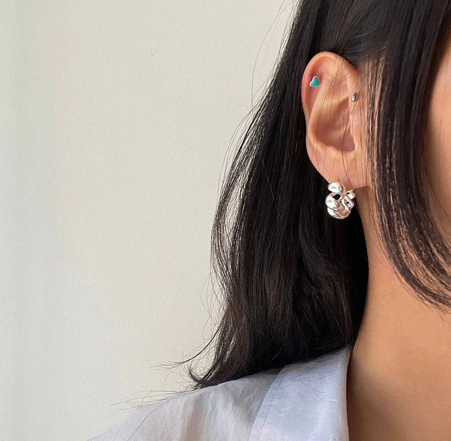 New Europe America and Korean Women Hoop Earrings 925 Sterling Silver Bone Cold Wind Twist Buckle Earrings