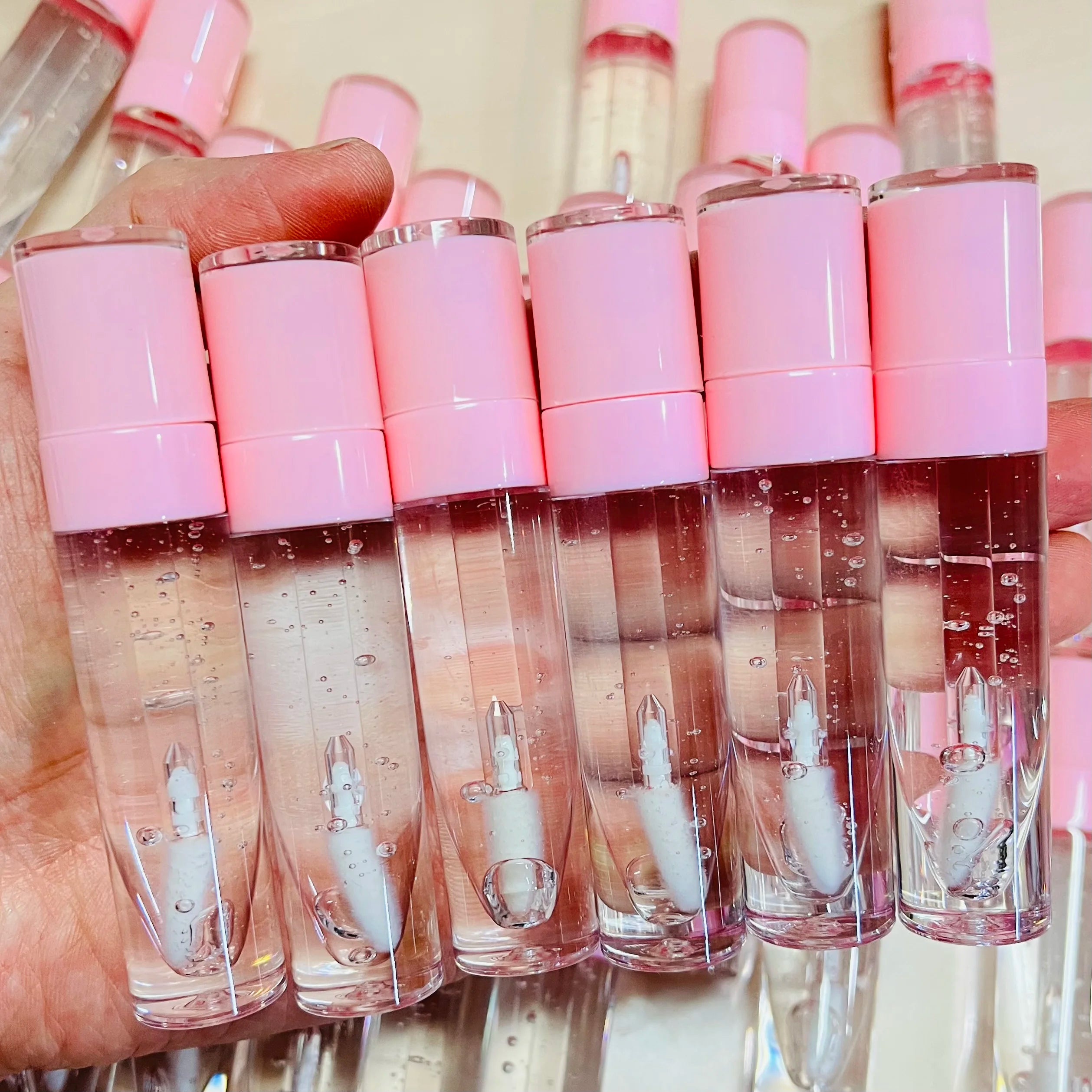 Wholesale pink Tube Custom Packaging logo clear Nude Lip Gloss Vendor
