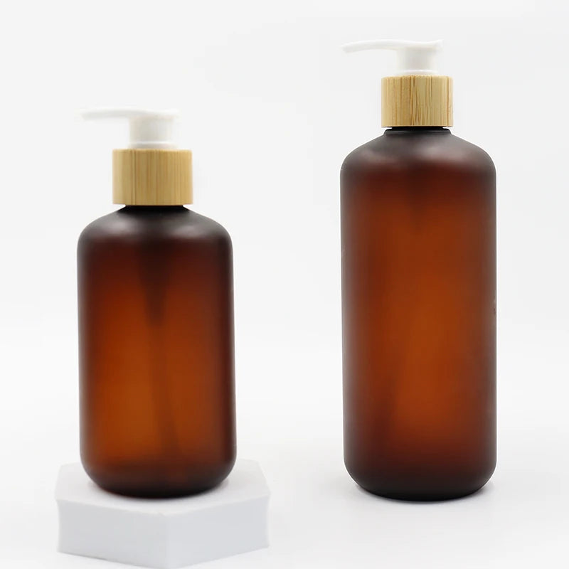 Plastic Mini Body Lotion Bottles 60ml 120ml 250ml Frosted Amber Pet Shampoo Bottles Packing with Bamboo