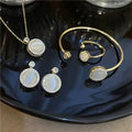 Dainty 4 Pcs/Set Bling Iced Out Cubic Zirconia CZ Round Earrings Bracelet Rotatable Opal Geometric Ring Necklace Jewelry Set