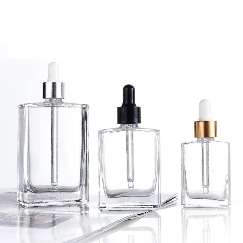 15ml 30ml 50ml 100ml Rectangle Clear Glass Essential Oil Bottle Dropper Screen Printing Carton Cosmetic Use Custom Logo Model