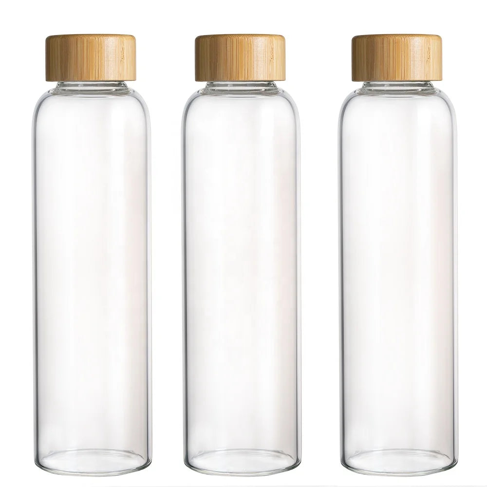 Wholesale Bamboo Lid Glass Water Bottles 18oz Reusable Clear Borosilicate Glass Water Bottle for Travel Fridge Beverage Juice